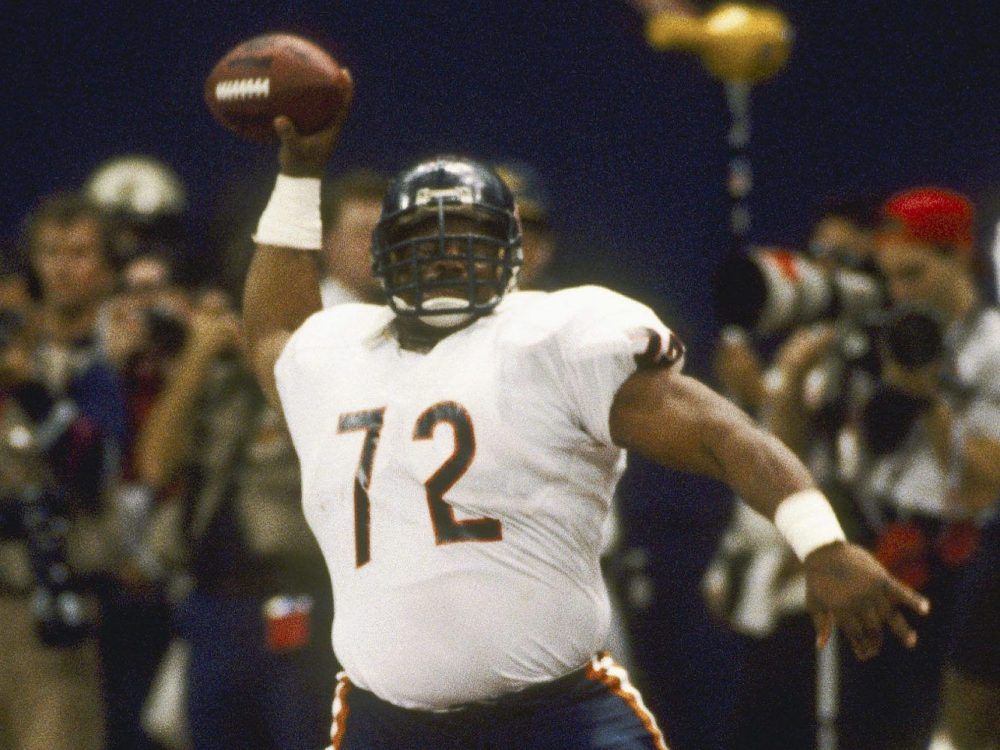 William Perry spikes the ball after scoring a touchdown