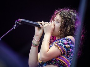 Aspects, a guitarist known for blending blues, soul, hip-hop and jazz, performs with his daughter, Illiyah Rose, during Ottawa Bluesfest at LeBreton Flats on Saturday, July 11, 2026.