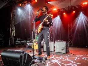 Hawaii-born singer-songwriter and guitarist Ron Artis II performs barefoot during Ottawa Bluesfest at LeBreton Flats on Saturday, July 11, 2026.
