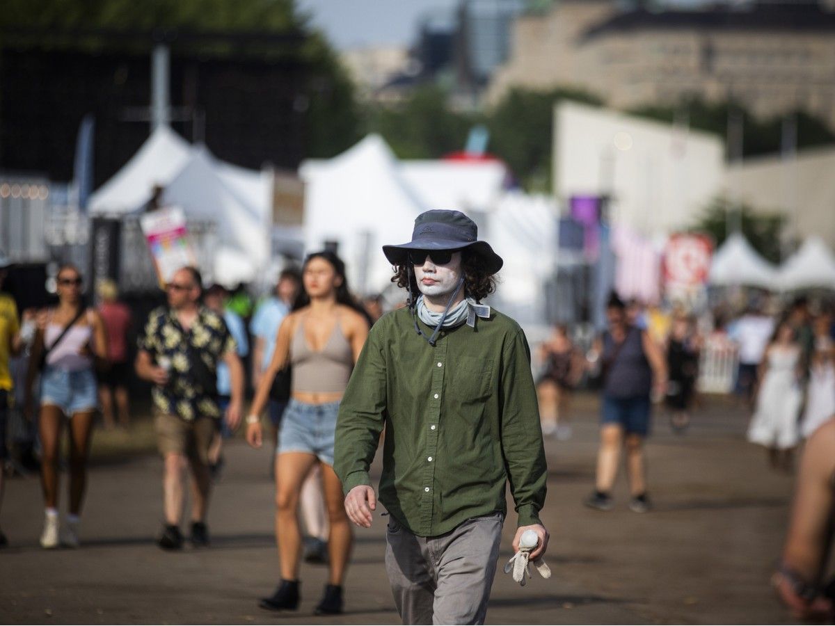 Festival-goers arrive to Ottawa Bluesfest at LeBreton Flats on Sunday, July 12, 2026. Festival-goers arrive to Ottawa Bluesfest at LeBreton Flats on Sunday, July 12, 2026.