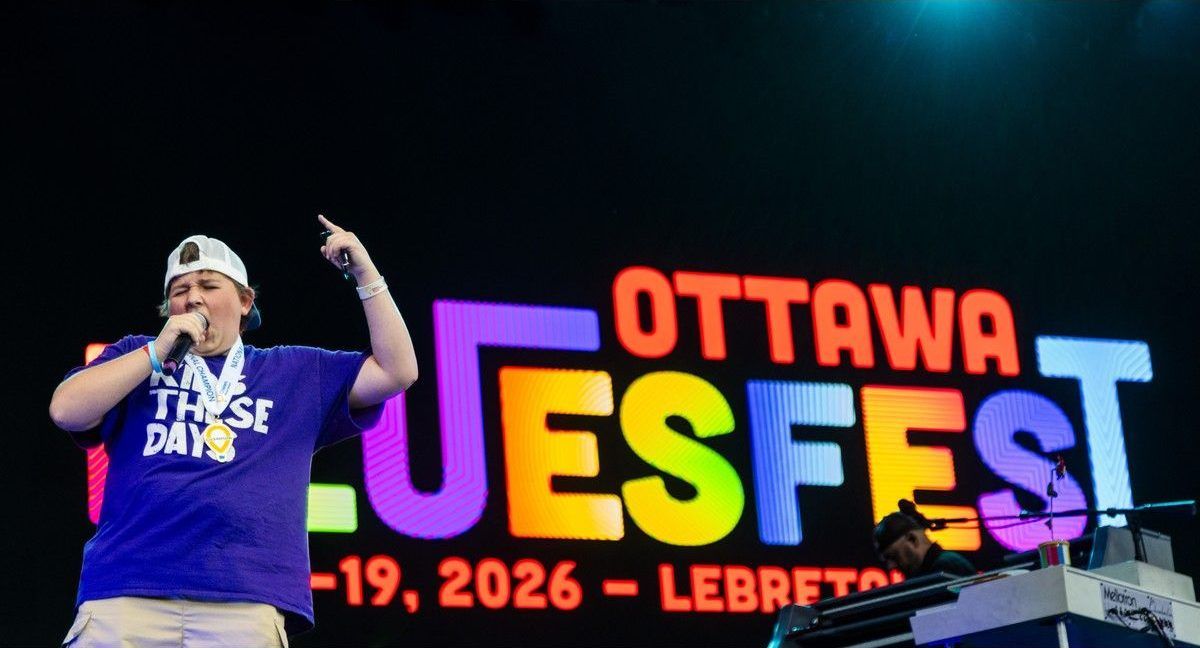 Kayden Dussault, CHEO’s 2026 Champion, speaks on stage about the partnership between Ottawa Bluesfest and the CHEO Foundation and hypes up the crowd on Sunday. Kayden Dussault, CHEO’s 2026 Champion, speaks on stage about the partnership between Ottawa Bluesfest and the CHEO Foundation and hypes up the crowd on Sunday.