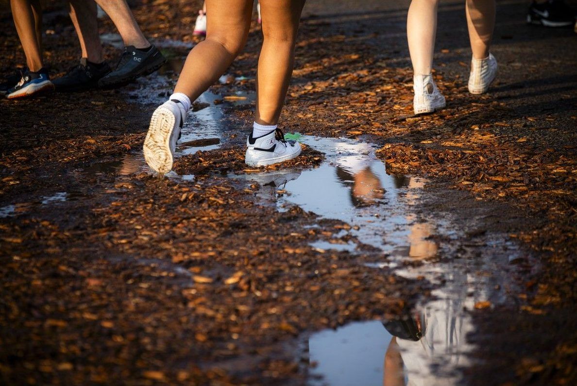 The rain that fell Saturday afternoon caused many mud puddles and sloppy areas for Ottawa Bluesfest at LeBreton Flats, Saturday, July 18, 2026. The rain that fell Saturday afternoon caused many mud puddles and sloppy areas for Ottawa Bluesfest at LeBreton Flats, Saturday, July 18, 2026.