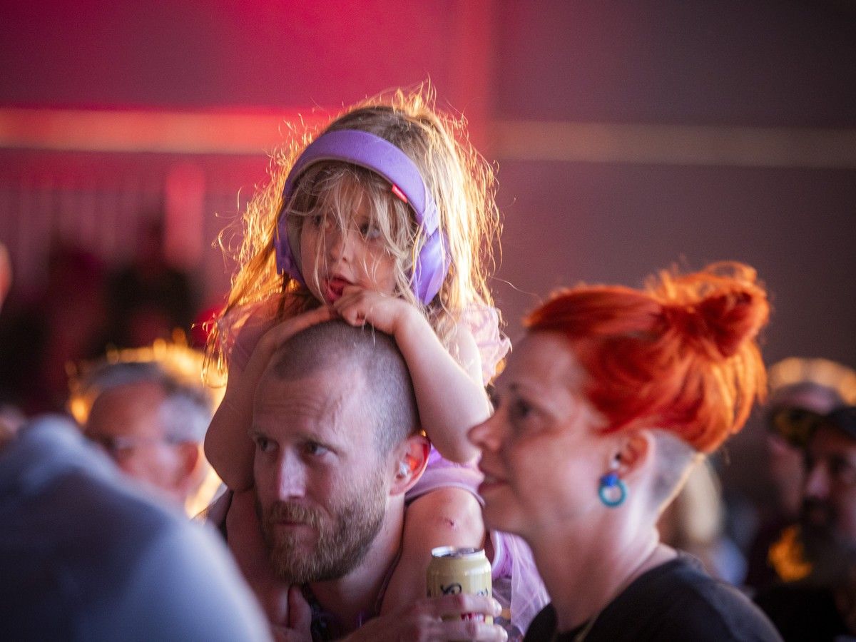 A young music fan watches Here Come the Mummies perform on the LeBreton Stage during Ottawa Bluesfest at LeBreton Flats, Saturday, July 18, 2026. A young music fan watches Here Come the Mummies perform on the LeBreton Stage during Ottawa Bluesfest at LeBreton Flats, Saturday, July 18, 2026.