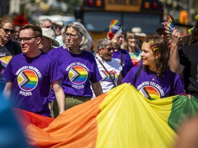 OCDSB trustee Donna Blackburn (middle) led a group of school board members in the Capital Pride parade in this 2024 file photo.
