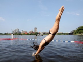 Tara Gosling enjoyed diving at the East Wharf NCC swimming dock near Parliament Hill and the Rideau Locks, July 01, 2026.