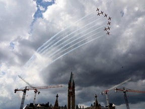 The Snowbirds fly past Parliament Hill and Ottawa during the Canada Day festivities in Ottawa last year. This year, the city is under a heat warning with the humidex rising as high as 47.