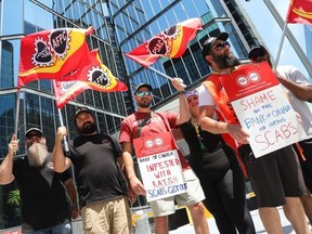 security officers at a picket line at the Bank of Canada