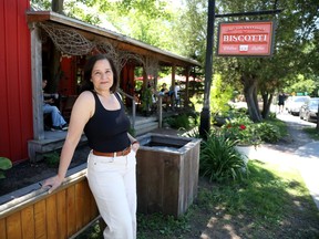 Manuela Teixeira, president and CEO of Square Old Chelsea is seen in front of her business, Biscotti et Cie.