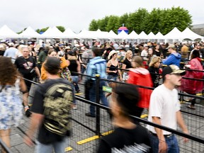 People make their way toward security during the opening night of Bluesfest at LeBreton Flats on Thursday, July 9, 2026.