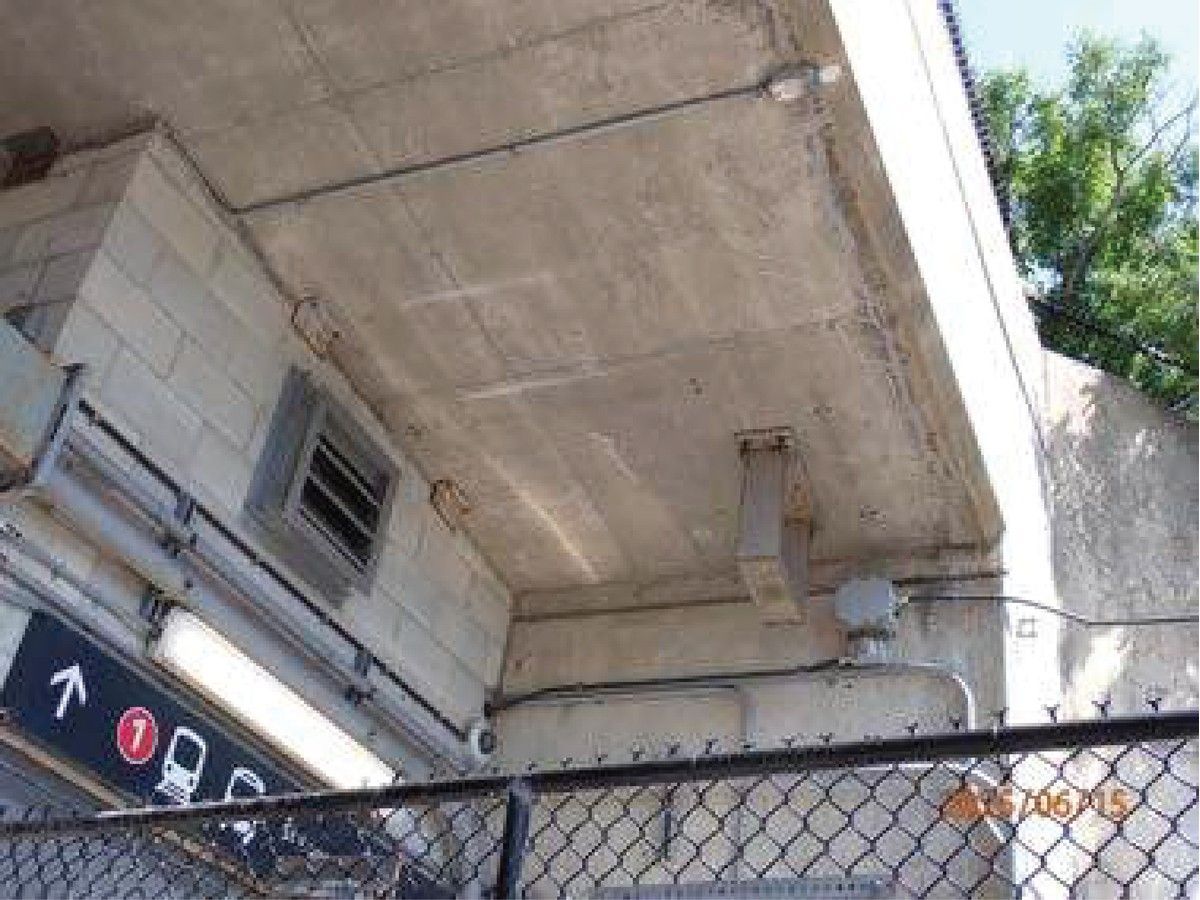 An image of small delamination and wide crack on an exterior soffit above the entrance to the southwest corridor of St. Laurent Station. An image of small delamination and wide crack on an exterior soffit above the entrance to the southwest corridor of St. Laurent Station.