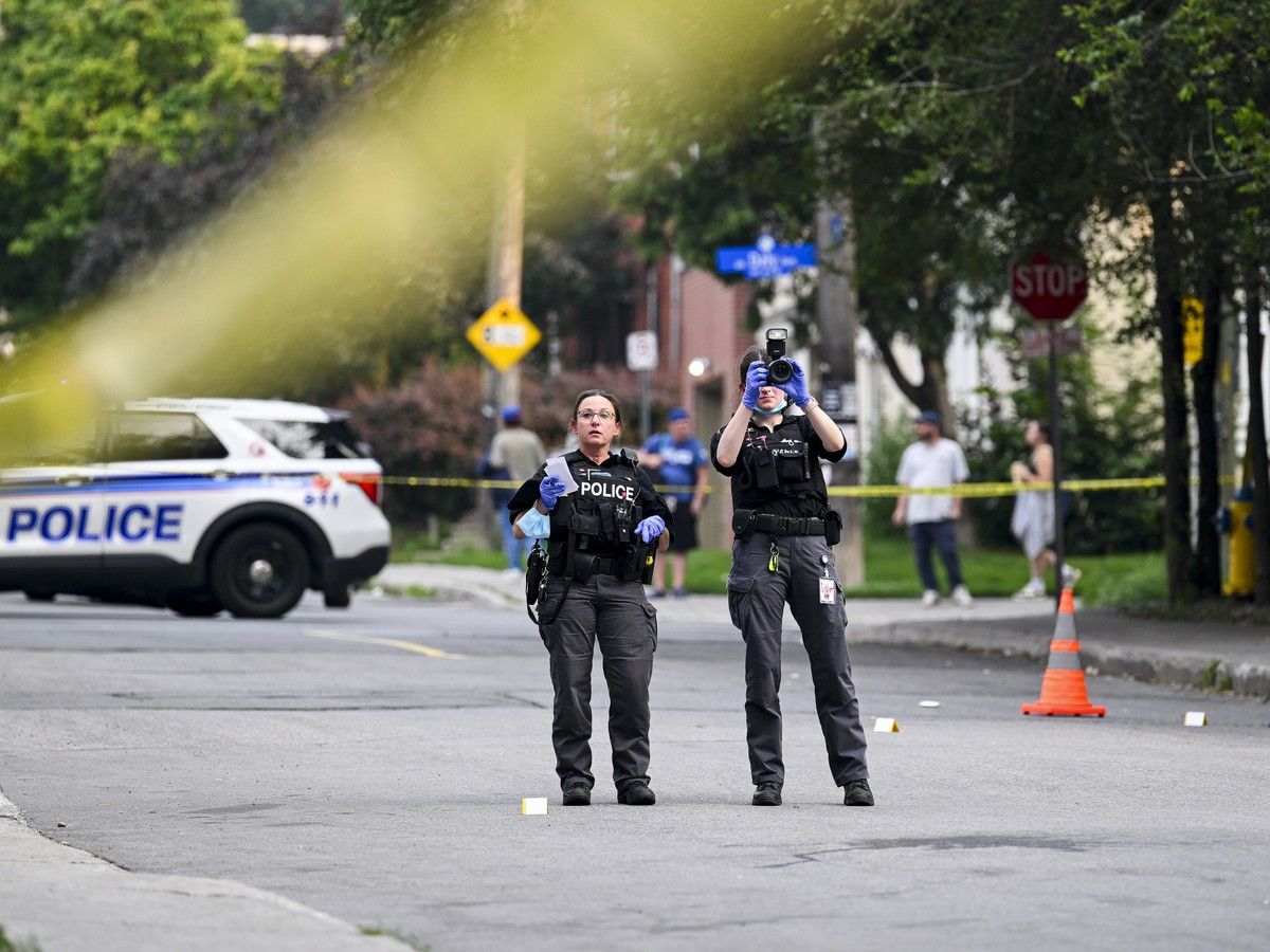 Officers from the Ottawa Police Service work the scene of a stabbing on Tuesday, July 14, 2026.