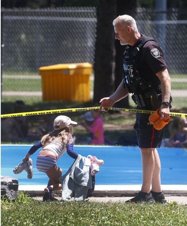  A young girl is in serious condition following a dramatic swimming pool incident at Sylvia Holden pool, off Queen Elizabeth Driveway near Fifth Avenue in the Glebe Friday. First responders were called to the scene shortly after noon. Ottawa lifeguards staff were shaken up at the scene. Ottawa Police were on scene investigating Friday afternoon.