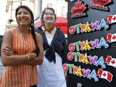 Riyaz Basi and Laura Blanchette pose for a photo in downtown Ottawa Friday. Basi is the Chair of Synapcity, a local grassroots civic engagement organization that's working with Laura Blanchette to produce and distribute a zine for every ward during election season.