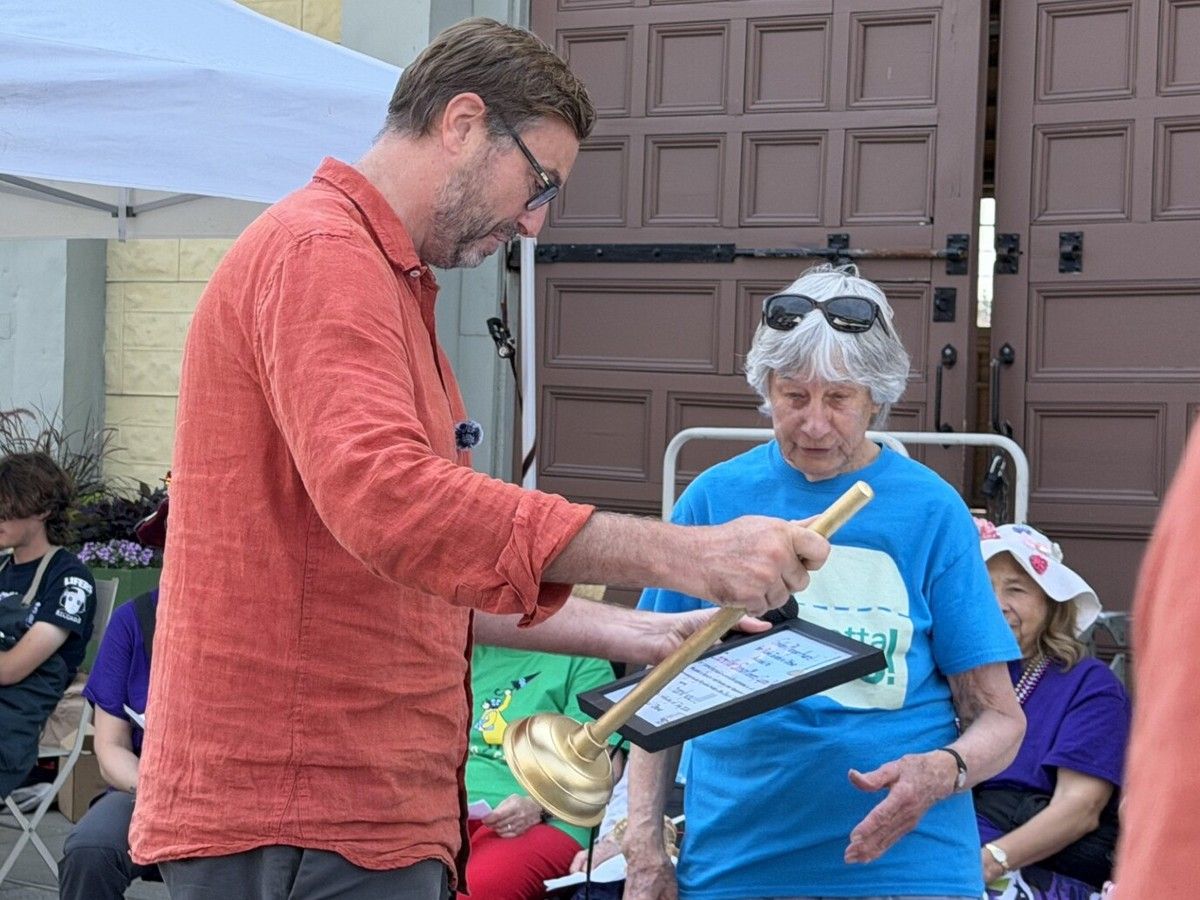  Capital ward Coun. Shawn Menard is pictured with GottaGo! co-founder Bessa Whitmore on Sunday, July 12, 2026, after he was recognized with the Golden Plunger award for his advocacy efforts in expanding washroom access both within his ward and across the city.