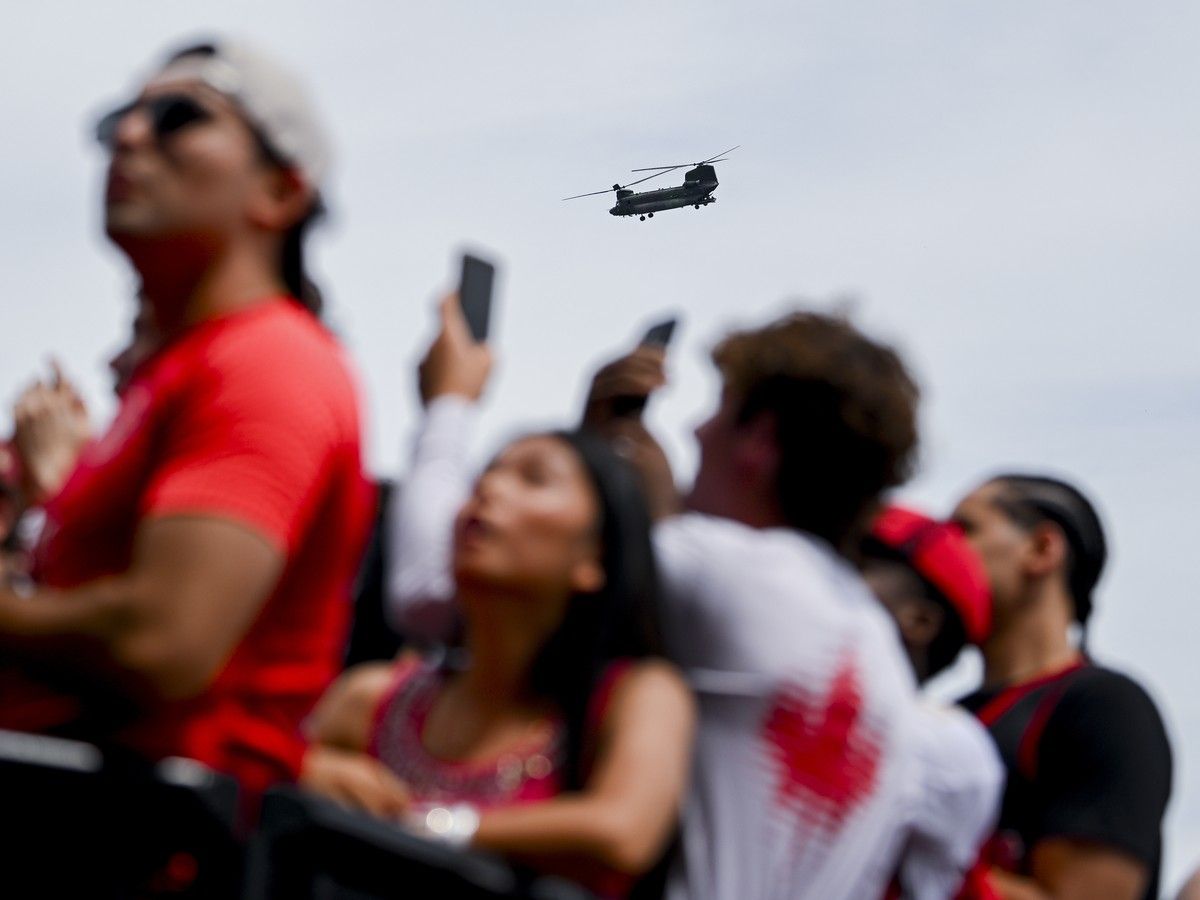 A Royal Canadian Air Force (RCAF) CH-47 Chinook conducts a fly-by as fans get set for the watch party at LeBreton Flats Park on Saturday. A Royal Canadian Air Force (RCAF) CH-47 Chinook conducts a fly-by as fans get set for the watch party at LeBreton Flats Park on Saturday.