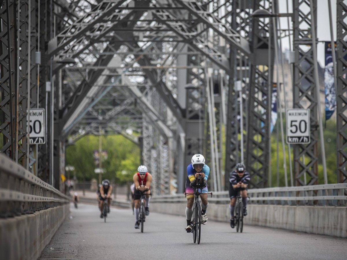 From a sea of carbon fibre bikes and high-tech race shoes to determined athletes chasing the finish line, competitors took on the 226-kilometre (140.6-mile) IRONMAN Canada-Ottawa course through Ottawa on Sunday. From a sea of carbon fibre bikes and high-tech race shoes to determined athletes chasing the finish line, competitors took on the 226-kilometre (140.6-mile) IRONMAN Canada-Ottawa course through Ottawa on Sunday.