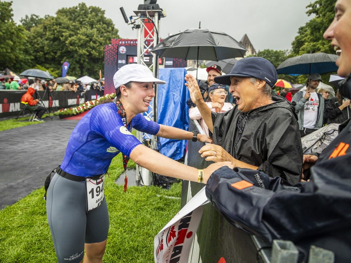 Ariane Lalancette was filled with emotions as she crossed the finish line and went straight to loved ones to celebrate her win as the top female finisher. Ariane Lalancette was filled with emotions as she crossed the finish line and went straight to loved ones to celebrate her win as the top female finisher.