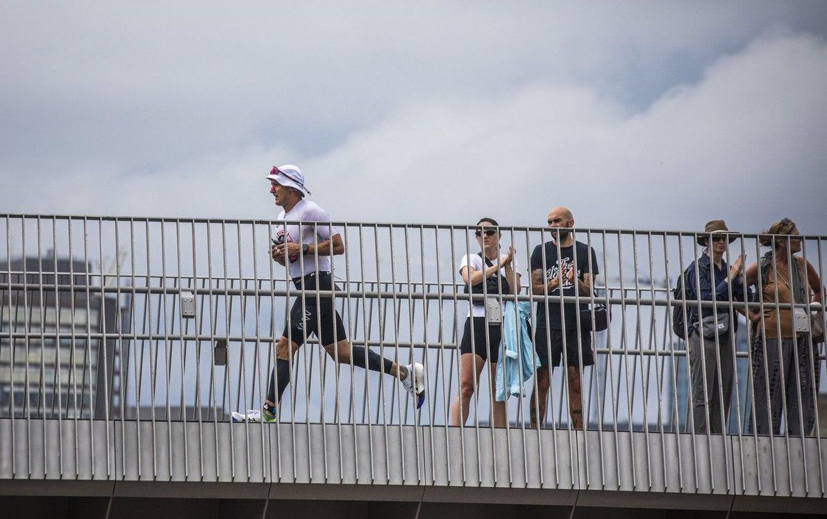 Brendan White starts the run portion of the race over Pìdàban Passage, the new bridge connecting Major’s Hill Park to the Kìwekì Point Sunday. Brendan White starts the run portion of the race over Pìdàban Passage, the new bridge connecting Major’s Hill Park to the Kìwekì Point Sunday.