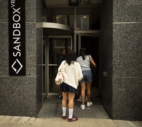 Ottawa Citizen reporter Abyssinia Abebe took part in a full-body virtual reality gaming experience at Sandbox VR in Ottawa's ByWard Market on Sunday, Aug. 9, 2026.