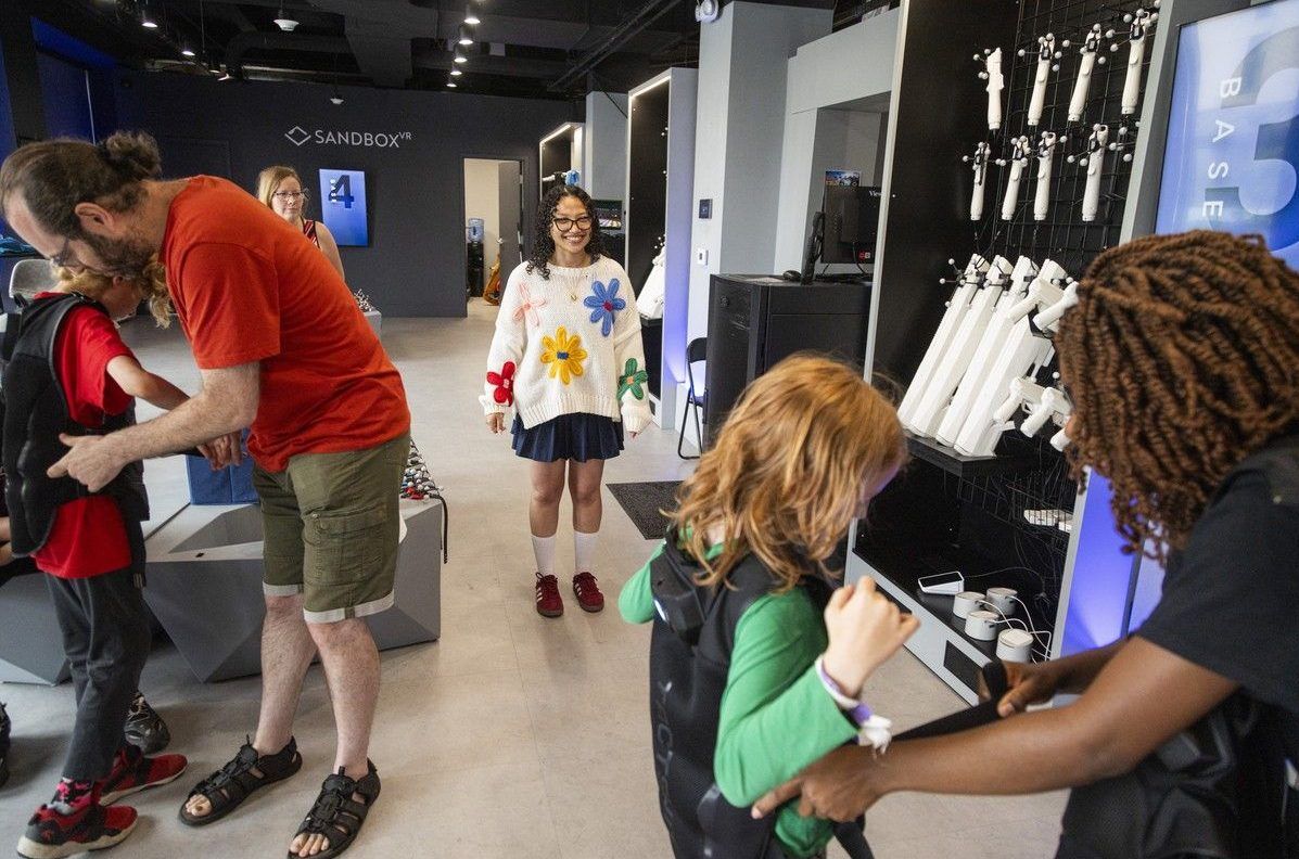 Ottawa Citizen reporter Abyssinia Abebe took part in a full-body virtual reality gaming experience at Sandbox VR in Ottawa's ByWard Market on Sunday, Aug. 9, 2026.