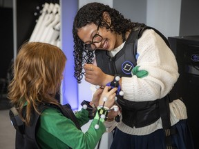 Ottawa Citizen reporter Abyssinia Abebe took part in a full-body virtual reality gaming experience at Sandbox VR in Ottawa's ByWard Market on Sunday, Aug. 9, 2026.