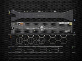 A computer server behind a metal cage.