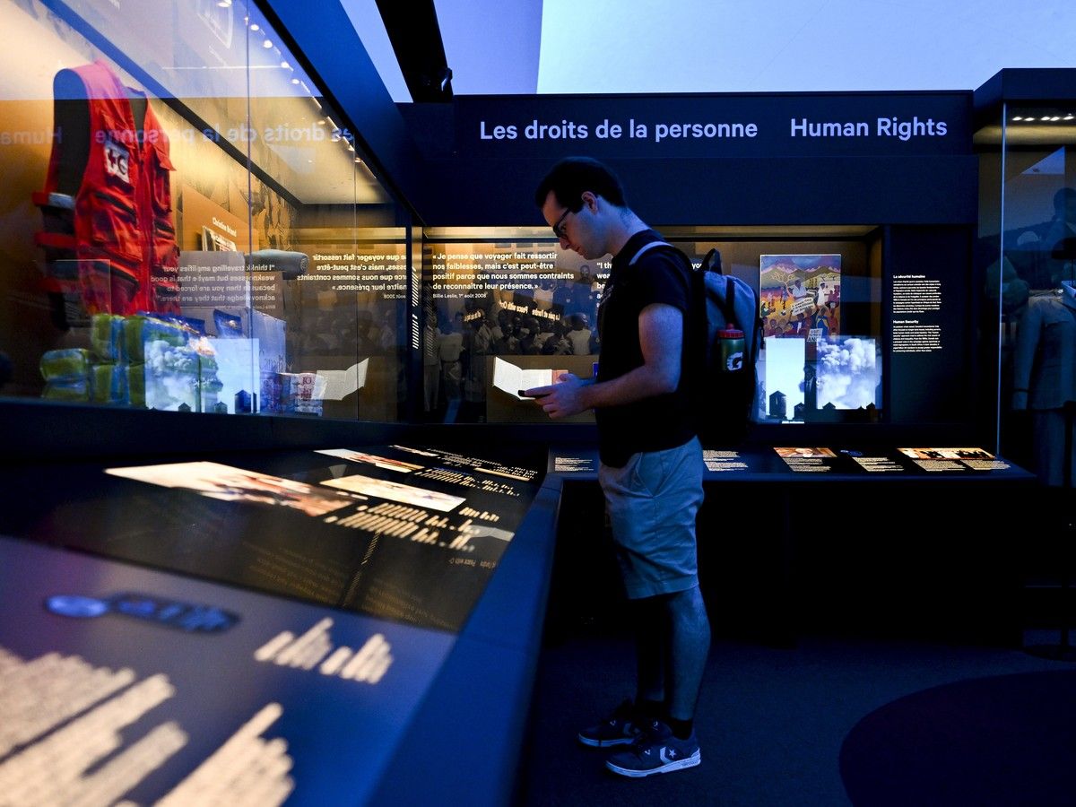Reporter Michael McBean reads information from a MUSEO AI chatbot at the Canadian Museum of History in Gatineau on Monday, Aug. 3, 2026. Reporter Michael McBean reads information from a MUSEO AI chatbot at the Canadian Museum of History in Gatineau on Monday, Aug. 3, 2026.