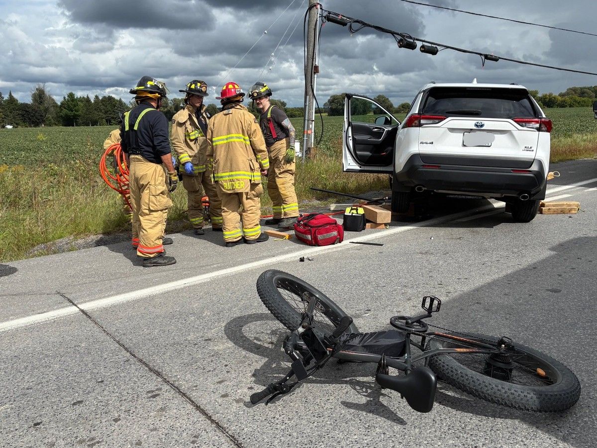 Ottawa firefighters extricated a cyclist who was pinned beneath a vehicle in Carp on Monday, Aug. 24, 2026.