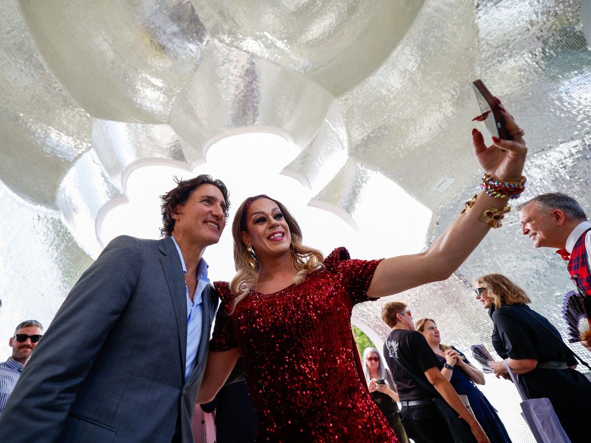 Former prime minister Justin Trudeau poses for a selfie with Jezebel, drag queen, at the end of the opening ceremony of the national 2SLBGTQI+ monument known as Thunderhead. Former prime minister Justin Trudeau poses for a selfie with Jezebel, drag queen, at the end of the opening ceremony of the national 2SLBGTQI+ monument known as Thunderhead.