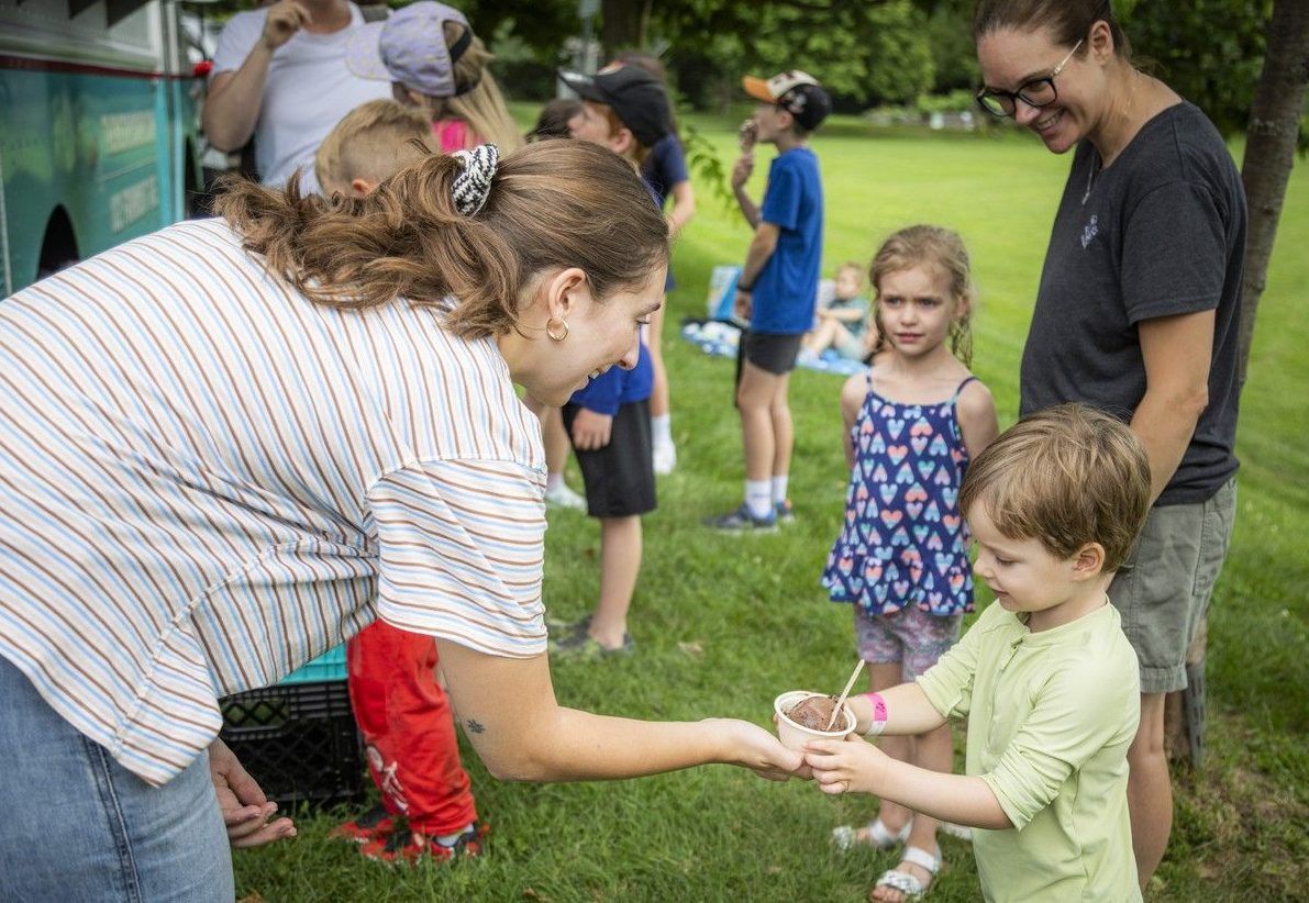 Olivia Belovich, left, serves up some ice cream at the Merry Dairy pop-up event at Frank Ryan Park on Aug. 1. Olivia Belovich, left, serves up some ice cream at the Merry Dairy pop-up event at Frank Ryan Park on Aug. 1.