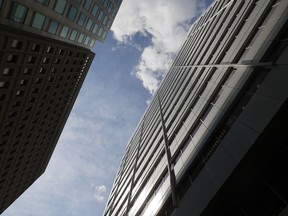 A view of the sky between two office buildings in downtown Ottawa.