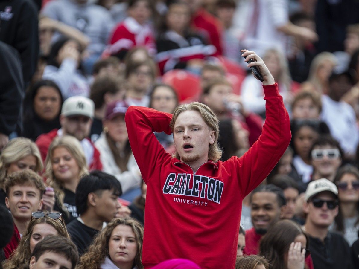  Carleton Ravens fans react to the action during the annual Panda Game against the University of Ottawa Gee-Gees at TD Place in Ottawa on Sunday, Oct. 4, 2026.