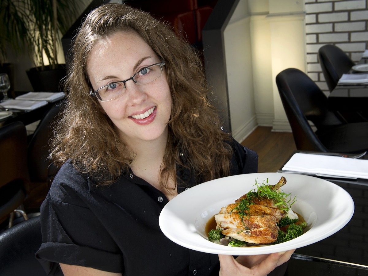  In this 2011 file photo, Chef Patricia Larkin of the Black Cat Cafe on Preston Street prepares truffled Quebec chicken breast.