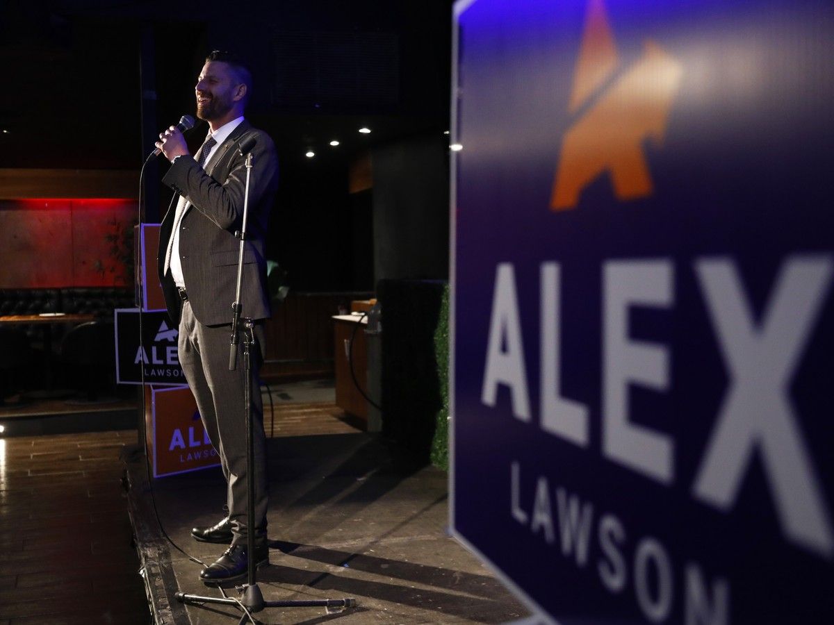 Mayoral candidate Alex Lawson speaks to his supporters at the Sky Lounge on Monday.