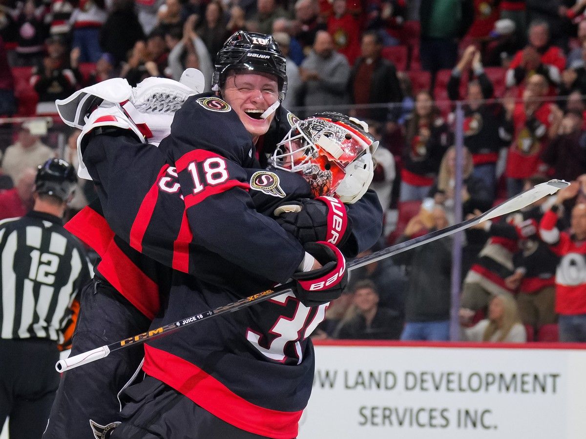 Linus Ullmark and Tim Stützle of the Ottawa Senators celebrate after a 3-2 shootout win against the Nashville Predators at the Canadian Tire Centre on Oct. 10, 2026.