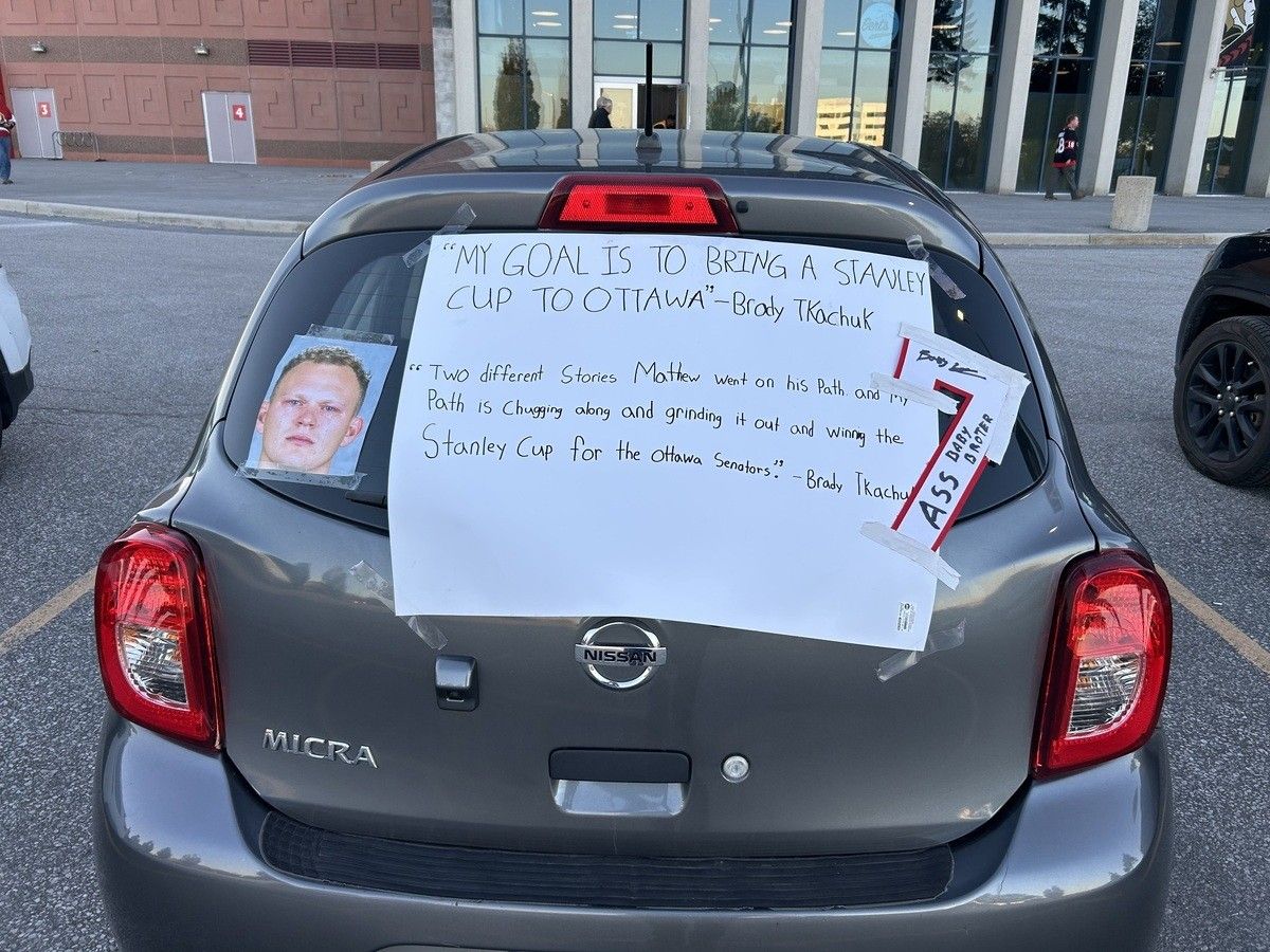 Brady Tkachuk's past words and promises are left taped on the rear window of a hatchback in the Canadian Tire Centre's Gate 3 parking lot before the NHL contest between the Ottawa Senators and Florida Panthers on Wednesday, Oct. 21, 2026.