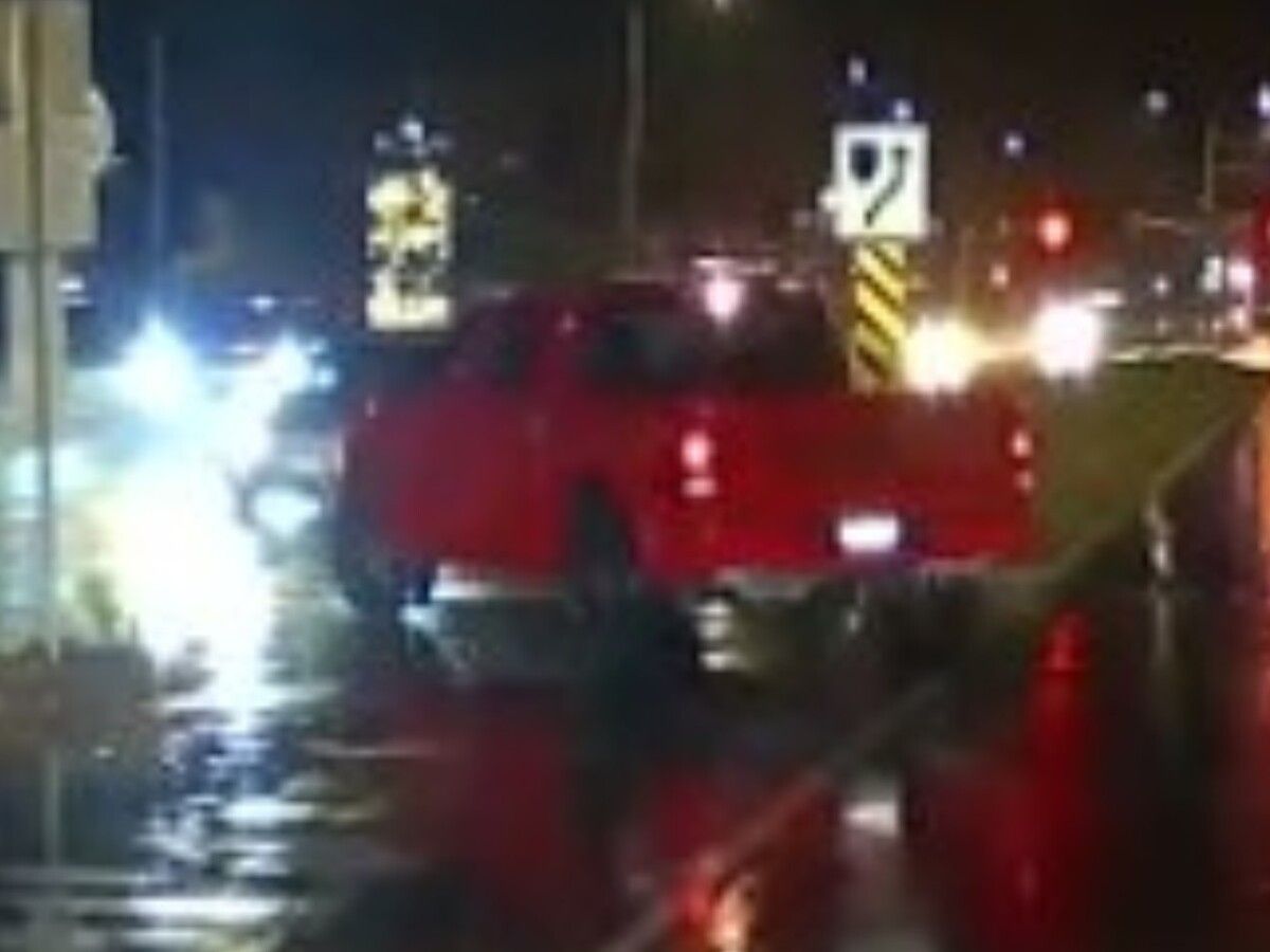 The Ottawa Police Service said it would like to speak with the driver of this red pickup truck as a witness to the fatal hit-and-run that killed a motorcyclist on Oct. 2. The Ottawa Police Service said it would like to speak with the driver of this red pickup truck as a witness to the fatal hit-and-run that killed a motorcyclist on Oct. 2.