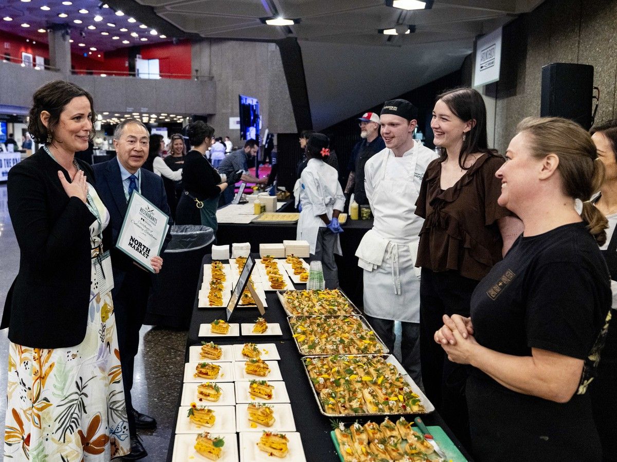 OTTAWA – Editor-in-chief of the Ottawa Citizen Nicole Feriancek, left, and Ottawa Citizen restaurant critic Peter Hum, centre-left, present the staff of North Market restaurant with a Certificate of Culinary Excellence award during the Ottawa Citizen Best Restaurants 2026 at the National Arts Centre on Monday, Oct. 19, 2026. Photo by Spencer Colby/Postmedia OTTAWA – Editor-in-chief of the Ottawa Citizen Nicole Feriancek, left, and Ottawa Citizen restaurant critic Peter Hum, centre-left, present the staff of North Market restaurant with a Certificate of Culinary Excellence award during the Ottawa Citizen Best Restaurants 2026 at the National Arts Centre on Monday, Oct. 19, 2026. Photo by Spencer Colby/Postmedia