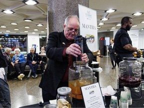 Ottawa Citizen columnist Bruce Deachman prepares cocktails for guests during the Ottawa Citizen Best Restaurants 2026 at the National Arts Centre on Monday.