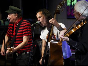Ottawa-based traditional three-piece combo band The Lockmasters perform during an election campaign event for mayoral candidates at the Dominion Tavern in the ByWard Market on Wednesday, Oct. 14, 2026.