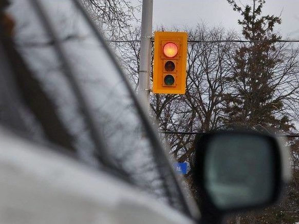 A file photo of a vehicle at a red light.