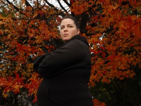 Kaitlynn Ford poses for a photo near her home in Ottawa. Earlier this month, the provincial government paused OSAP payouts because of reports of fraudulent activity at some colleges.