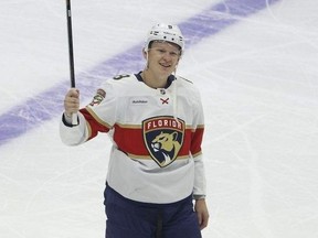 Brady Tkachuk from the Florida Panthers waves to the fans after a video tribute during the first period at the Canadian Tire Centre in Ottawa Wednesday. The fans booed so loud no one could hear the video.