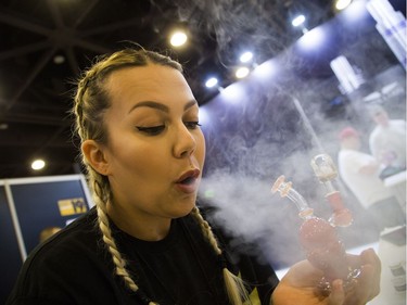Tina Ronison show she vaporizes by dabbing on a quartz banger at the Cannabis & Hemp Expo Saturday October 28, 2017 at the Shaw Centre.