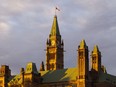 Early morning light on Parliament Hill as seen from Major's Hill Park. New harassment guidelines will update policies for Hill employees. Pat McGrath, Ottawa Citizen