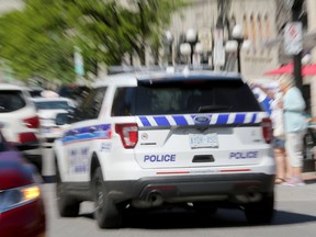 STOCK ART of Ottawa Police at Ambulance vehicles. Julie Oliver/Postmedia