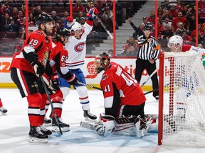 The Senators' Derick Brassard (19), Erik Karlsson, second from left, and Craig Anderson (41) sag while the Canadiens' Charles Hudon #54 of the Montreal Canadiens celebrates his second goal of the first period on Monday.