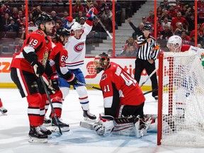 The Senators' Derick Brassard (19), Erik Karlsson, second from left, and Craig Anderson (41) sag while the Canadiens' Charles Hudon #54 of the Montreal Canadiens celebrates his second goal of the first period on Monday. Jana Chytilova/Freestyle Photography/Getty Images