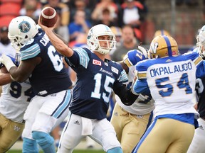 Toronto Argonauts quarterback Ricky Ray lets fly against the Winnipeg Blue Bombers during first half CFL football action in Toronto on Saturday, October 21, 2017. THE CANADIAN PRESS/Nathan Denette