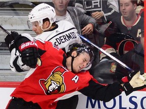 Senators centre Kyle Turris collides with the Kings' Kurtis MacDermid in the third period of last Tuesday's game at Canadian Tire Centre. Turris hasn't played since then because of a viral infection and is doubtful for Monday's matchup with the Canadiens. THE CANADIAN PRESS/Sean Kilpatrick